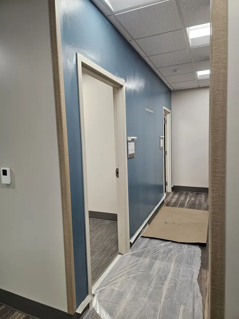 Commercial interior with a finished blue accent wall