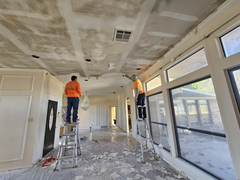 Ceiling drywall removal in a protected residential room