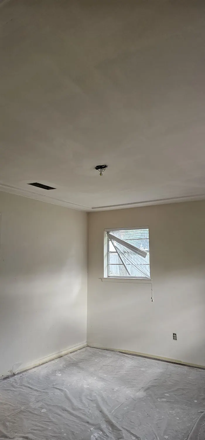 Residential ceiling surface repaired and sanded smooth