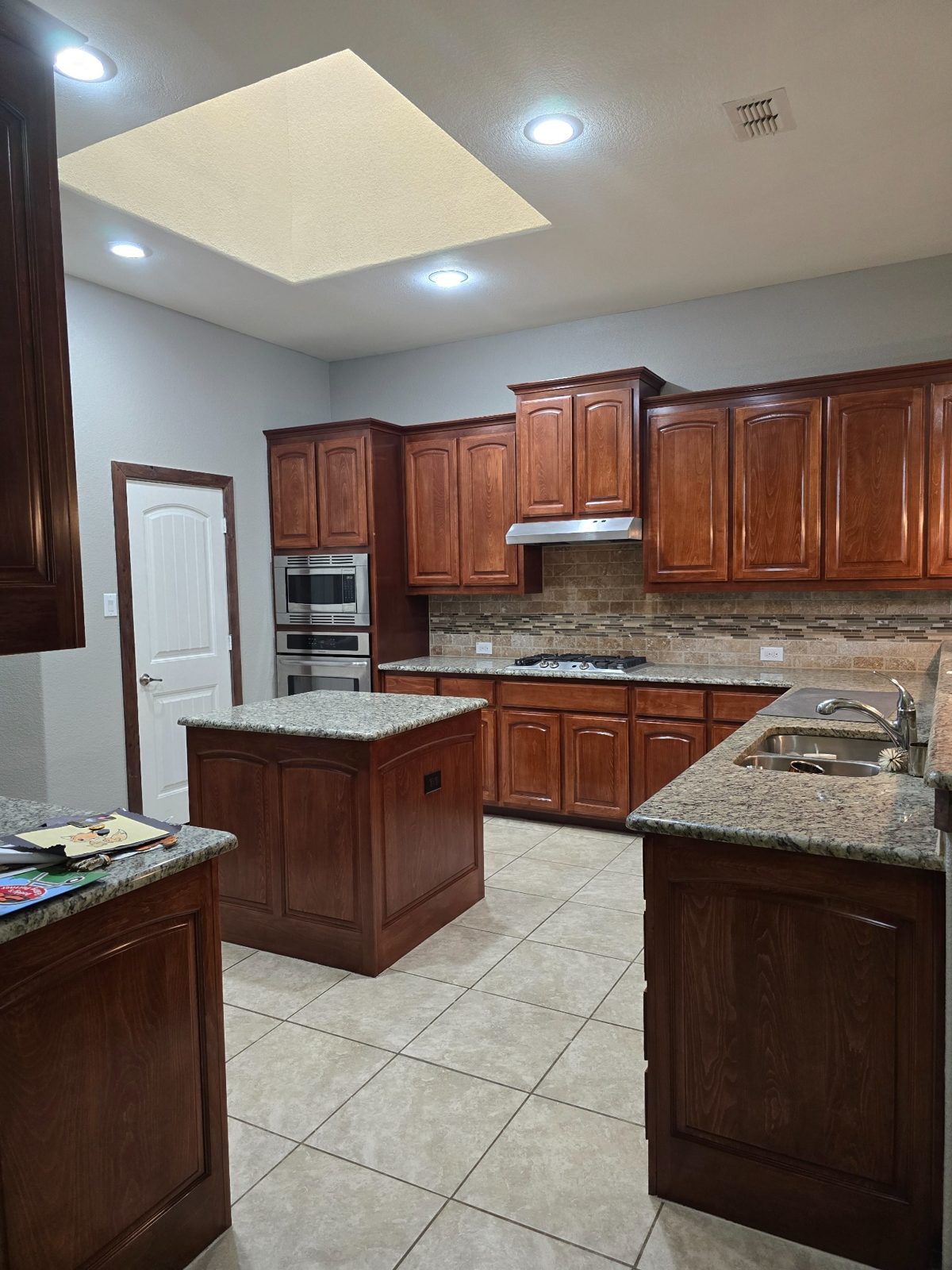 Finished kitchen cabinets and remodeling work by GMP Drywall LLC in DFW