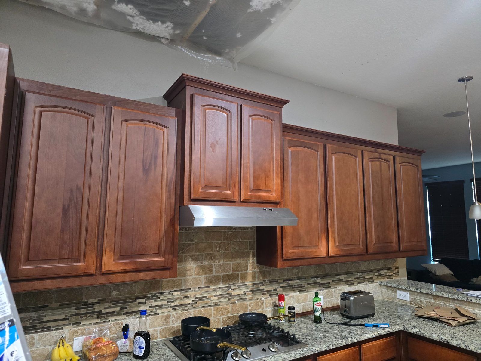 Kitchen cabinets before painting and refinishing in Mansfield TX