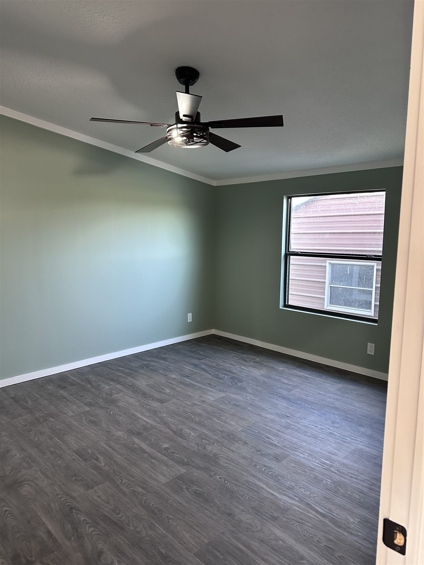 Residential interior painting with clean trim and flooring